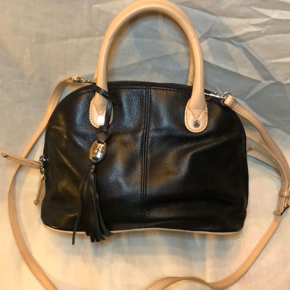 Beautiful Tignanello Black and Tan leather bag.